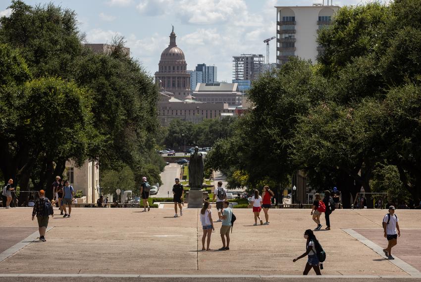 Students walk through campus at the University of Texas at Austin on Aug. 25, 2021.